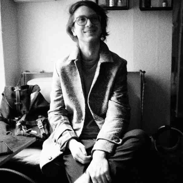 a picture of me. black and white by the lake & putting on a glove